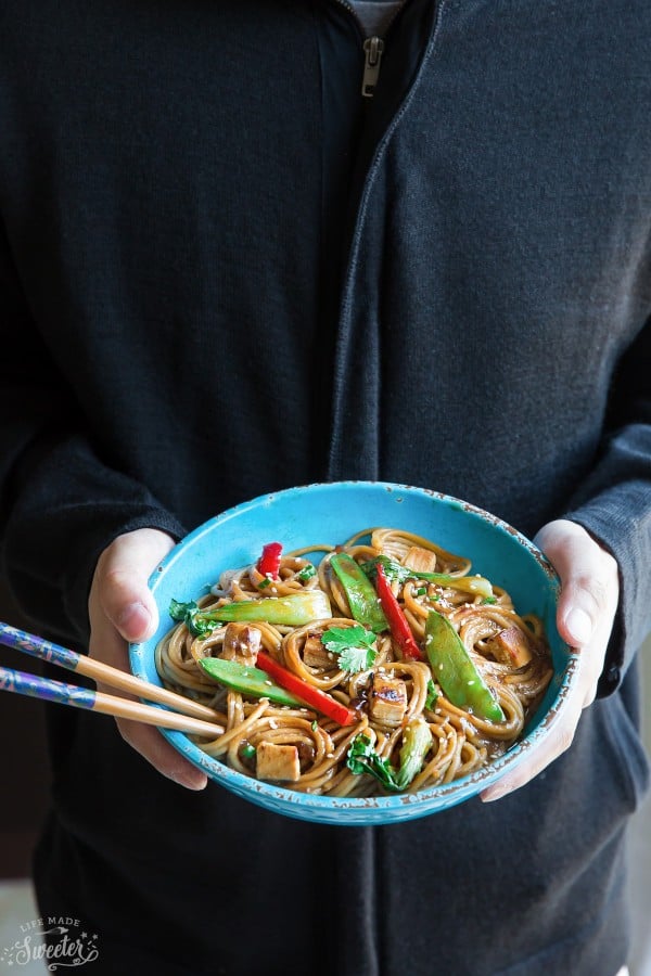 A serving of Slow Cooker Chicken Lo Mein in a bowl with chopsticks