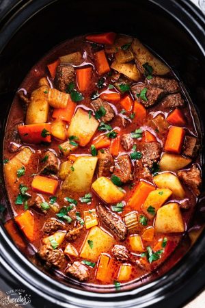 Slow Cooker Homemade Beef Stew makes the perfect comforting dish on a cold day. Best of all, it’s easy to make and simmers in the crock-pot for the most tender meat with carrots, potatoes, sweet potatoes and celery.