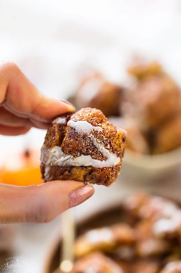 Slow Cooker Pumpkin Monkey Bread makes the perfect easy breakfast or brunch. Best of all, it's so easy to make with refrigerated cinnamon roll dough and it's full of cozy fall spices and a pumpkin cheesecake filling. So delicious for the holidays or any regular day.