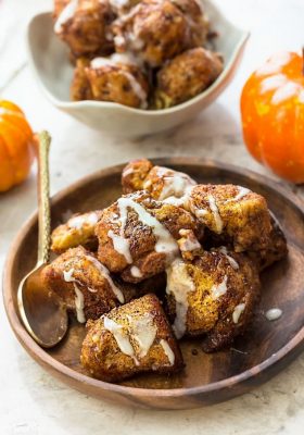 Slow Cooker Pumpkin Monkey Bread makes the perfect easy breakfast or brunch. Best of all, it's so easy to make with refrigerated cinnamon roll dough and it's full of cozy fall spices and a pumpkin cheesecake filling. So delicious for the holidays or any regular day.
