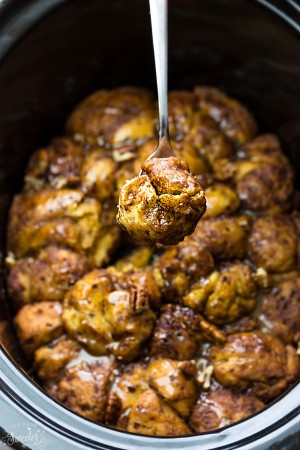 Slow Cooker Pumpkin Monkey Bread makes the perfect easy breakfast or brunch. Best of all, it's so easy to make with refrigerated cinnamon roll dough and it's full of cozy fall spices and a pumpkin cheesecake filling. So delicious for the holidays or any regular day.
