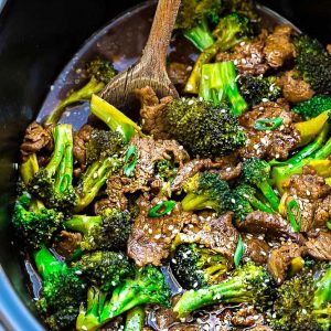 Slow Cooker Beef & Broccoli - an easy set and forget Chinese takeout favorite perfect for busy weeknights. Best of all, the beef cooks up melt-in your mouth delicious in a rich and savory sauce. Recipe also includes Instant Pot directions and works great for Sunday meal prep for work or school lunchboxes.
