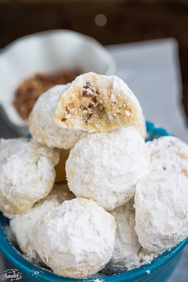 Top view of snowball cookies in blue bowl