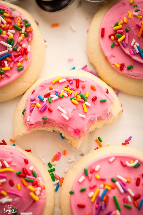 Soft Lofthouse Style Frosted Sugar Cookies are the perfect sweet treat with a tall glass of milk