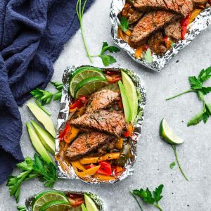Steak Fajita Foil Packets are the perfect easy & low carb meal for summer grilling, camping and cookouts. Best of all, they’re loaded with all your favorite Tex Mex flavors. Paleo, whole 30, gluten free & keto friendly meal.