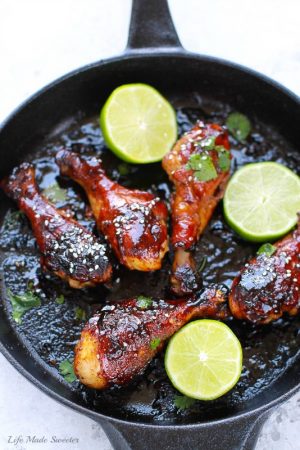 Sticky Honey Sriracha Chicken - Easy chicken drumsticks loaded with zesty Asian flavors are the perfect balance of spicy, tangy & sweet.