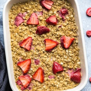 Strawberry Baked Oatmeal (Muffin Cups) - the perfect easy make ahead breakfast for spring and summer. Best of all, this recipe is simple to customize and made with gluten free oats, sweet and juicy fresh & freeze-dried strawberries and refined sugar free.