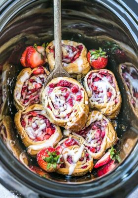 Easy Strawberry Cinnamon Rolls make the perfect indulgent treat for breakfast, brunch or even dessert. Best of all, these effortless rolls take no time at all in your oven or slow cooker using Pillsbury crescent roll dough, fresh strawberries and a cinnamon sugar filling. No yeast or rising required!
