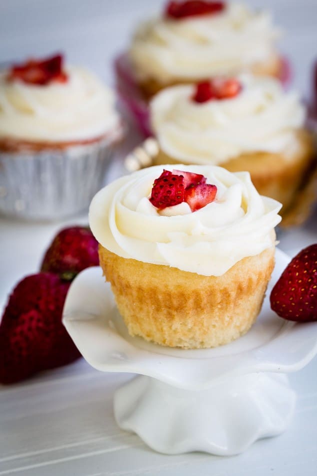 Strawberry Filled Vanilla Cupcakes make the perfect celebratory treat!