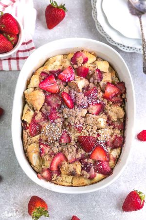 Overnight Strawberry Cream Cheese French Toast Bake Casserole Bake makes the perfect, easy and delicious breakfast, brunch or dessert. A great recipe to add to Mother's Day, Easter, Fourth of July or any special weekend occasion.