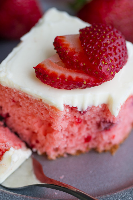 Strawberry Frosted Sheet Cake is bursting with loads of fresh strawberries and perfect for sharing at summer parties