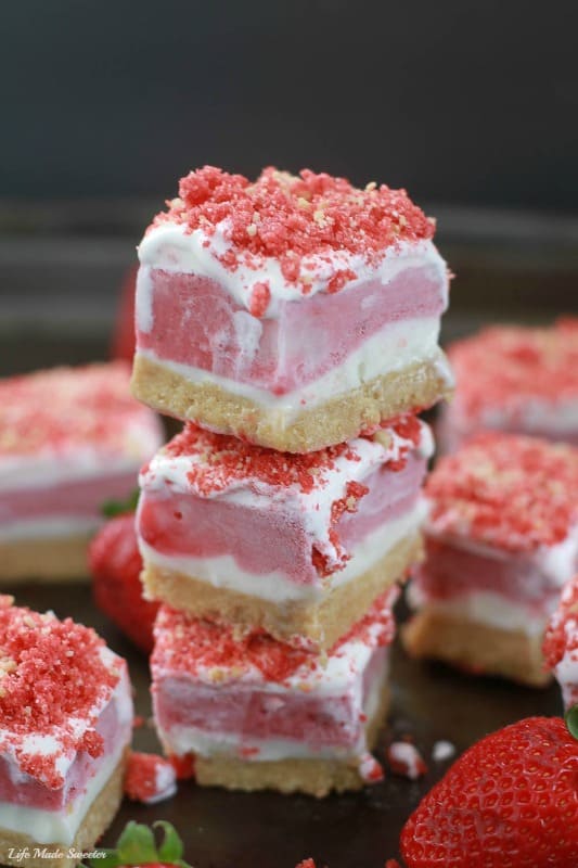Easy 5 ingredient strawberry shortcake ice cream bars with the best Golden Oreo top & no-bake cookie crust. A fun twist of Good Humor Ice Cream Popsicles