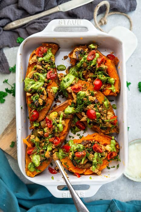 A White Pan Filled with Stuffed Sweet Potatoes