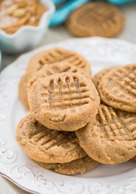 6 Soft and Chewy Keto Peanut Butter Cookies on a white plate