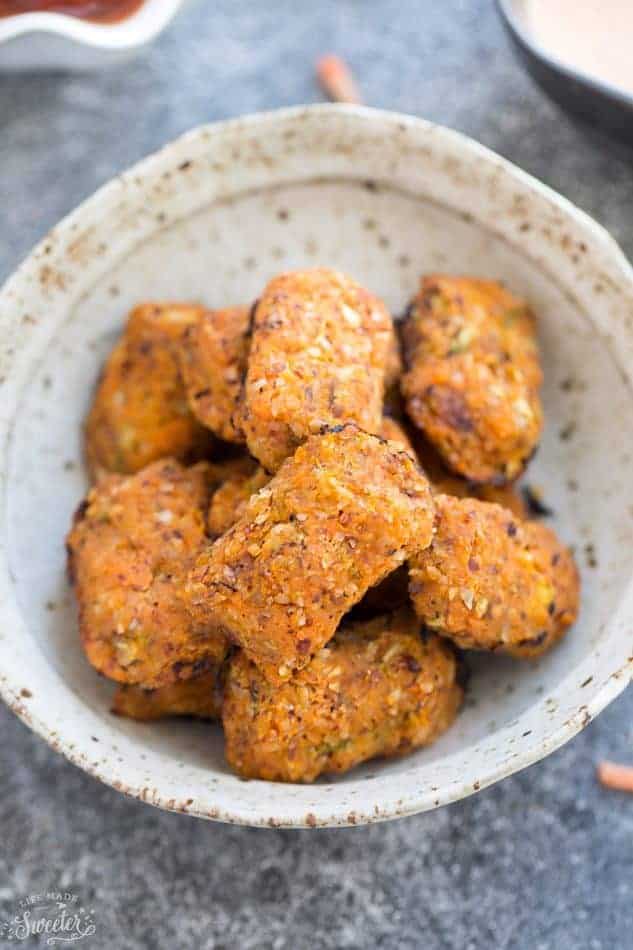 Vegan Sweet Potato Zucchini Tots in a small serving bowl on a table.