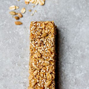 Top view of a Tahini Maple Granola Bar on a gray background