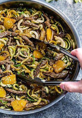 One Pan Teriyaki Beef Stir-Fry {Zucchini Noodles} is the perfect easy gluten free (or paleo) weeknight meal! Best of all, it takes only 30 minutes to make in just one pot and is so much healthier and better than takeout! Great for Sunday meal prep and leftovers make delicious lunch bowls for work or school lunchboxes! Plus Video!