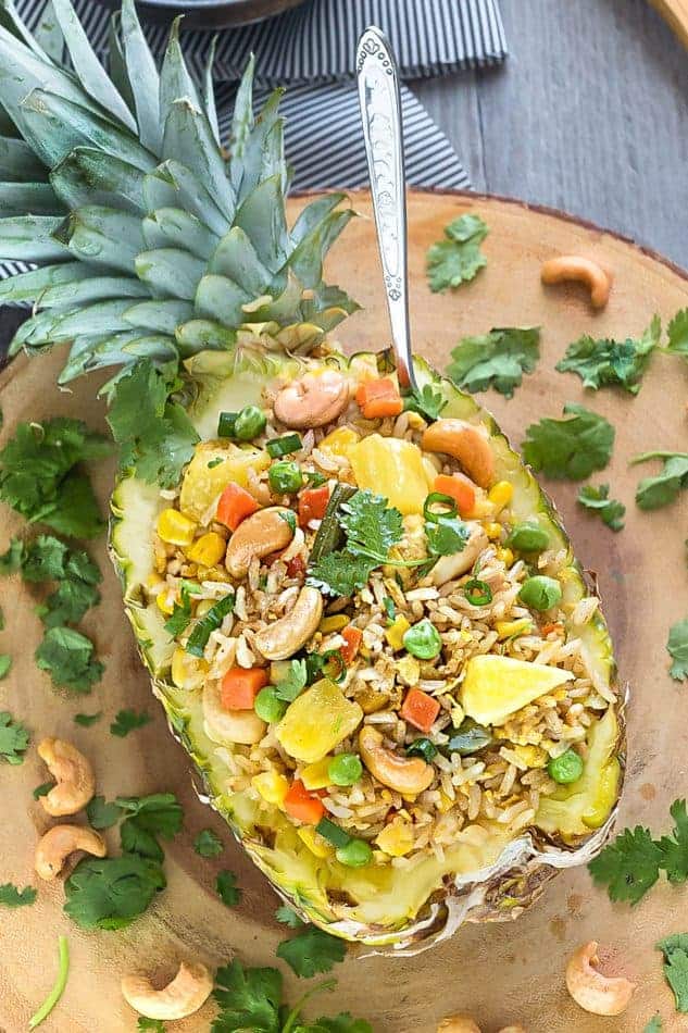 homemade Pineapple Fried Rice served in half of a whole pineapple