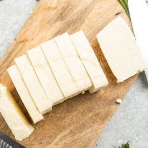 Top view of a block of tofu cut into strips