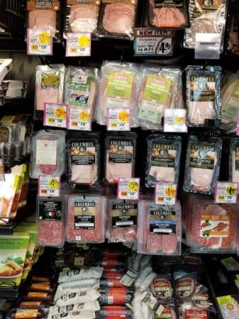Packages of sliced deli meat in the cooler section at Trader Joe's