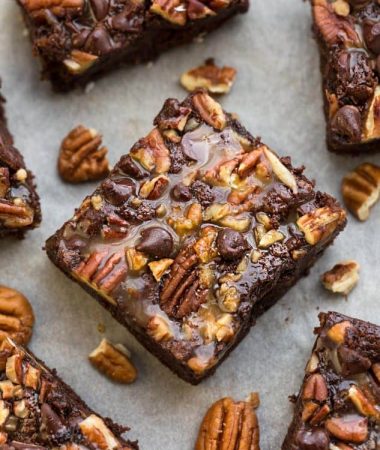 Close-up of Paleo Turtle Brownies on parchment paper