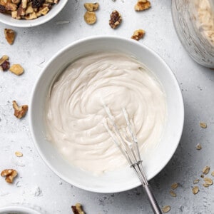Vegan cream cheese frosting in a white bowl