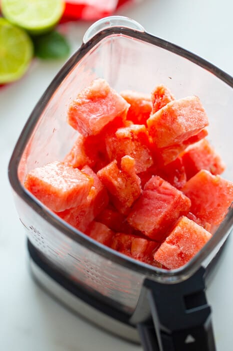 Cubes of Frozen Watermelon Inside of a Glass Blender