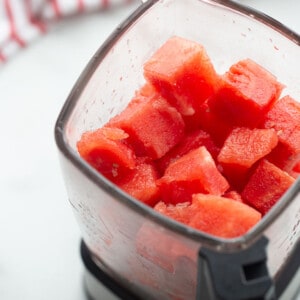 Top view of watermelon chunks in a blender
