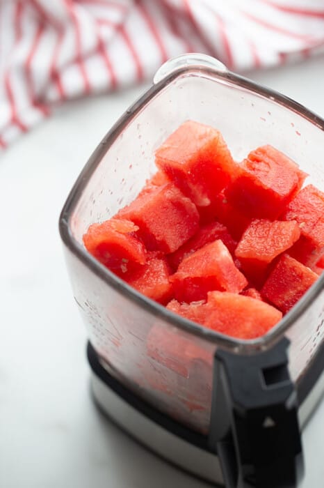 Top view of watermelon chunks in a blender