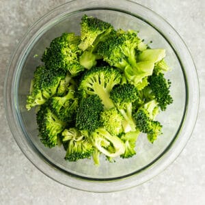 Top view of chopped broccoli in a bowl