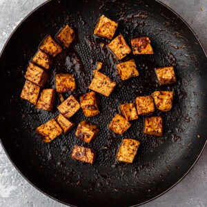Sauteed tofu in a skillet