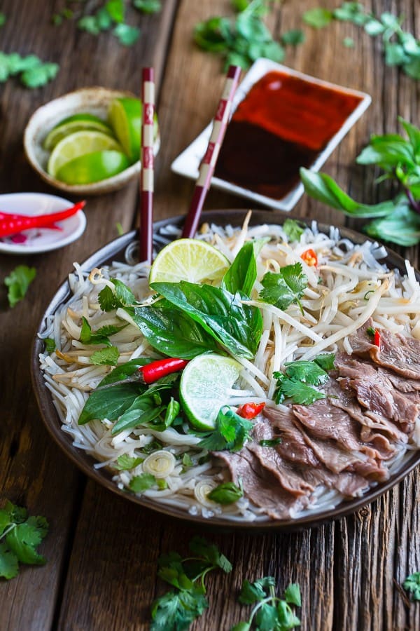 Vietnamese Pho Bo Rice Noodles make the perfect comforting meal. Best on those cold chilly nights!