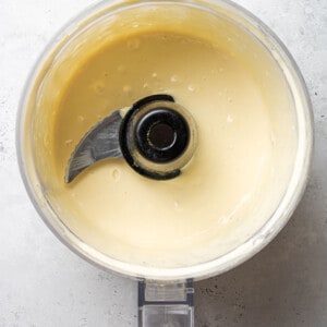 Top view of blended mayo in a food processor
