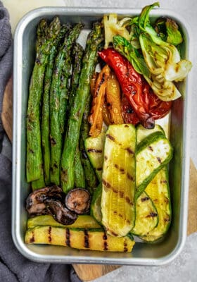 Top view of grilled vegetables on a baking sheet