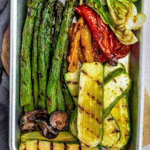 Top view of grilled vegetables on a baking sheet