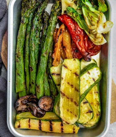Top view of grilled vegetables on a baking sheet