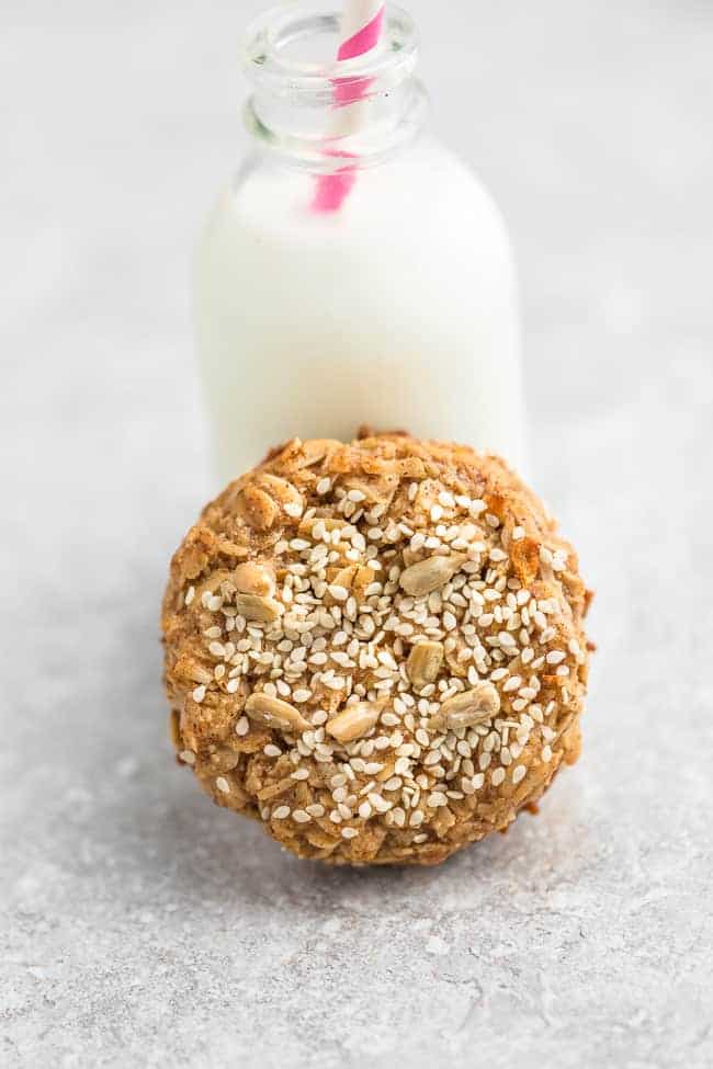 Tahini oat cookie paired with glass of milk.