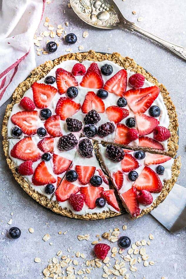 Colorful breakfast pizza made with fresh fruit and oats.