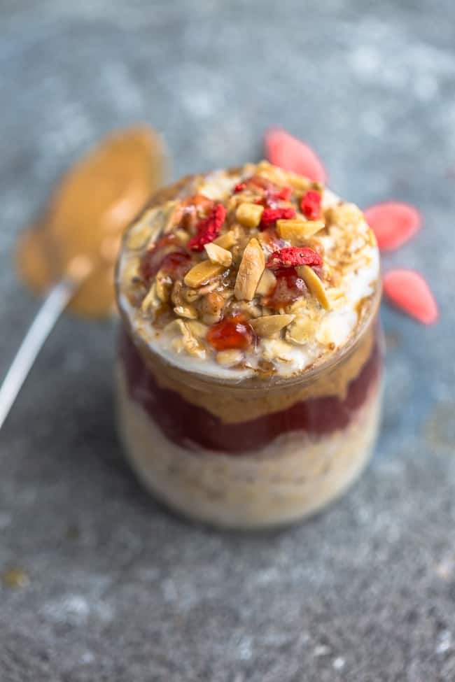 side view of peanut butter overnight oats recipe with berries