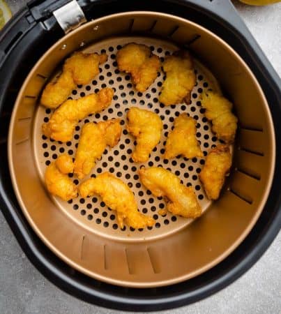Top view of breaded fried chicken pieces in an instant pot