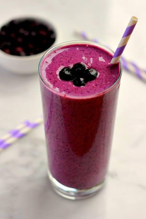 A glass of blueberry blast smoothie