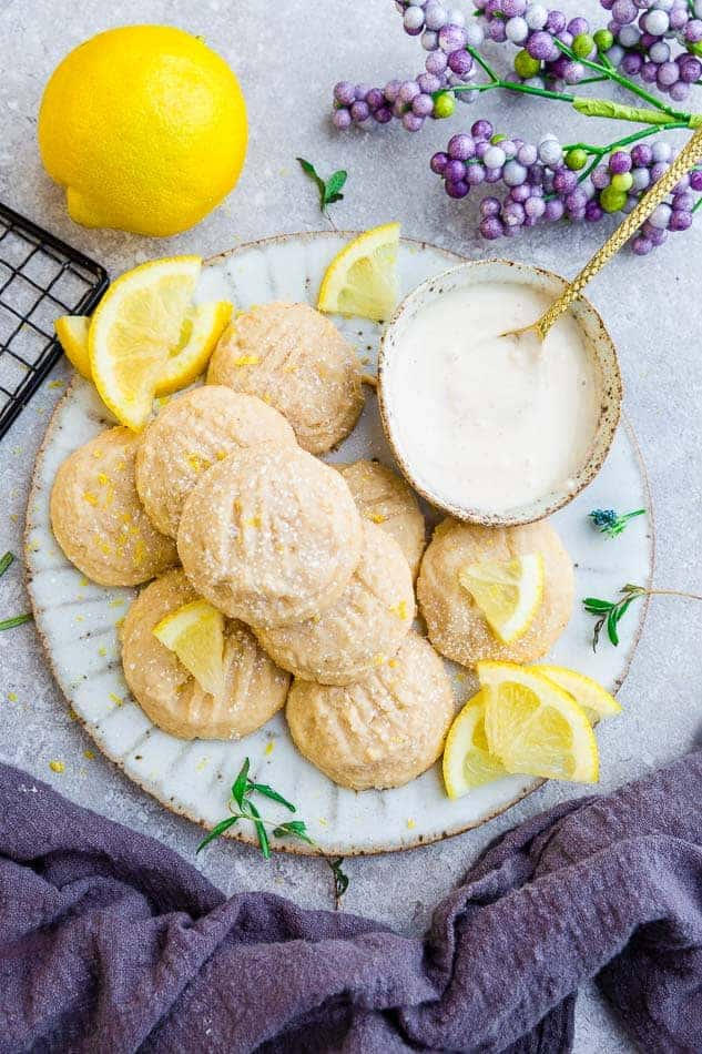 Easy eggless keto lemon cookies with a lemon and purple napkin. 