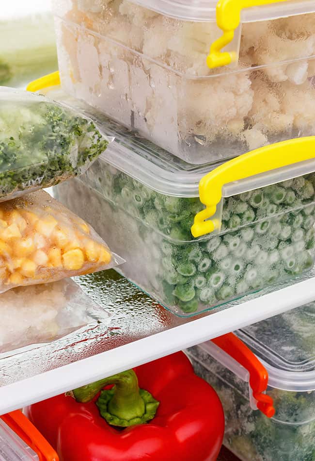 image of food in freezer such as peas and red bell pepper